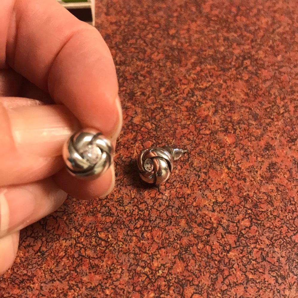 Brighten silver tone studs with clear stone